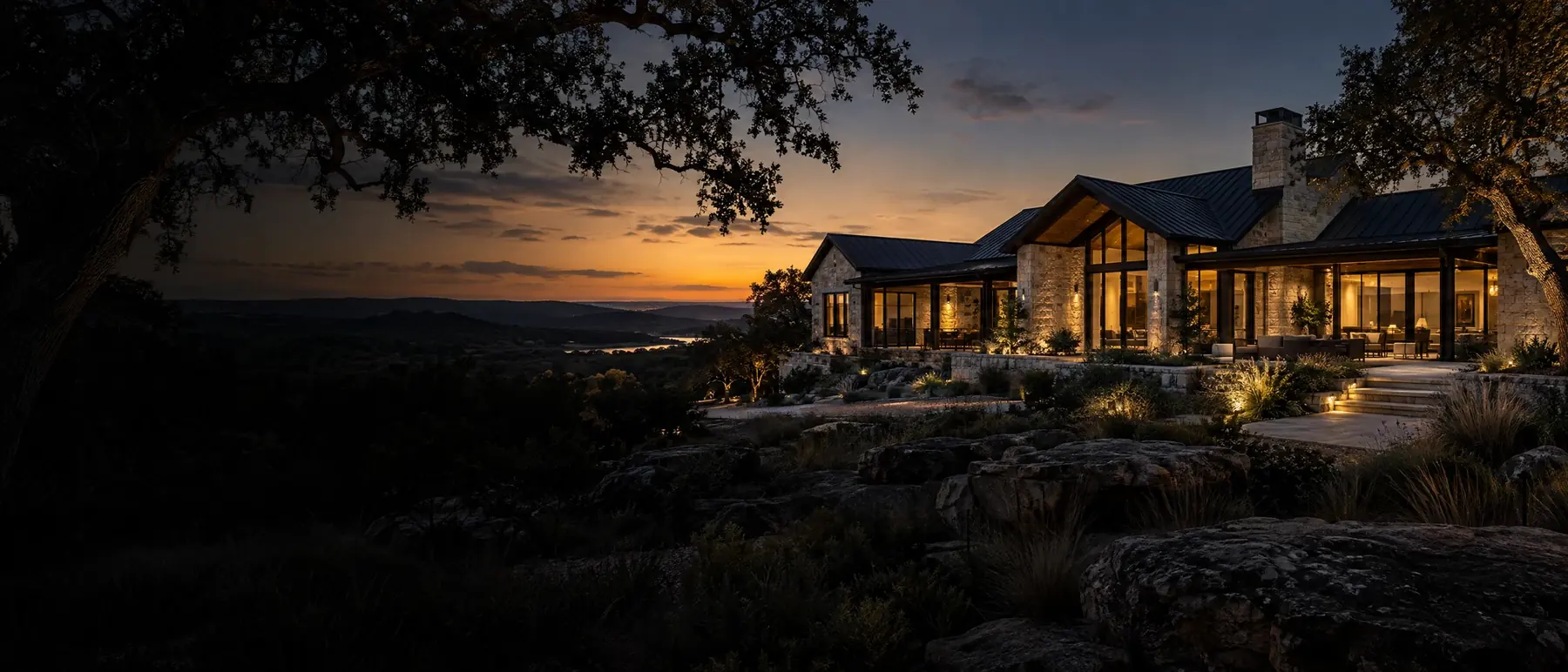 Atmospheric image of an imagined limestone home at dusk; not a Royale project photo